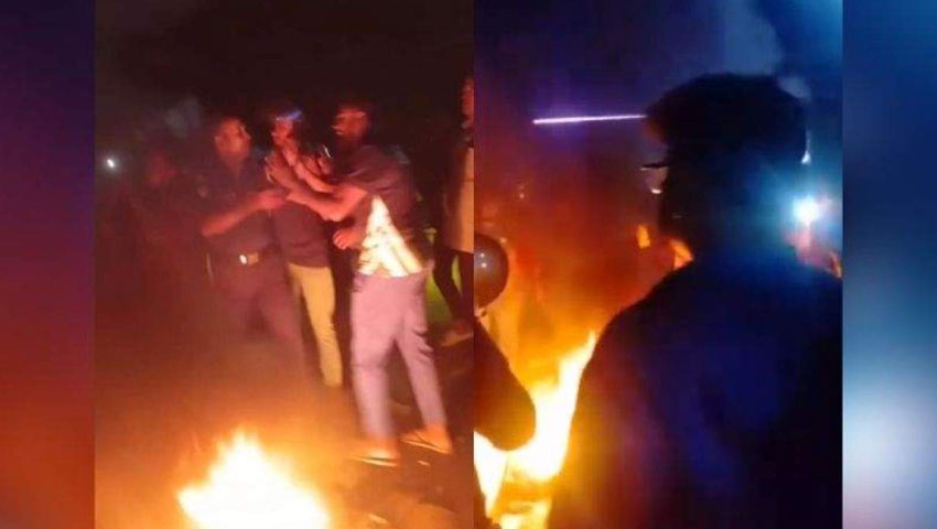 তেল না পেয়ে সড়কে আগুন জ্বালিয়ে অবরোধ